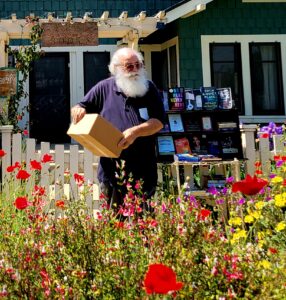 Kevin delivering books